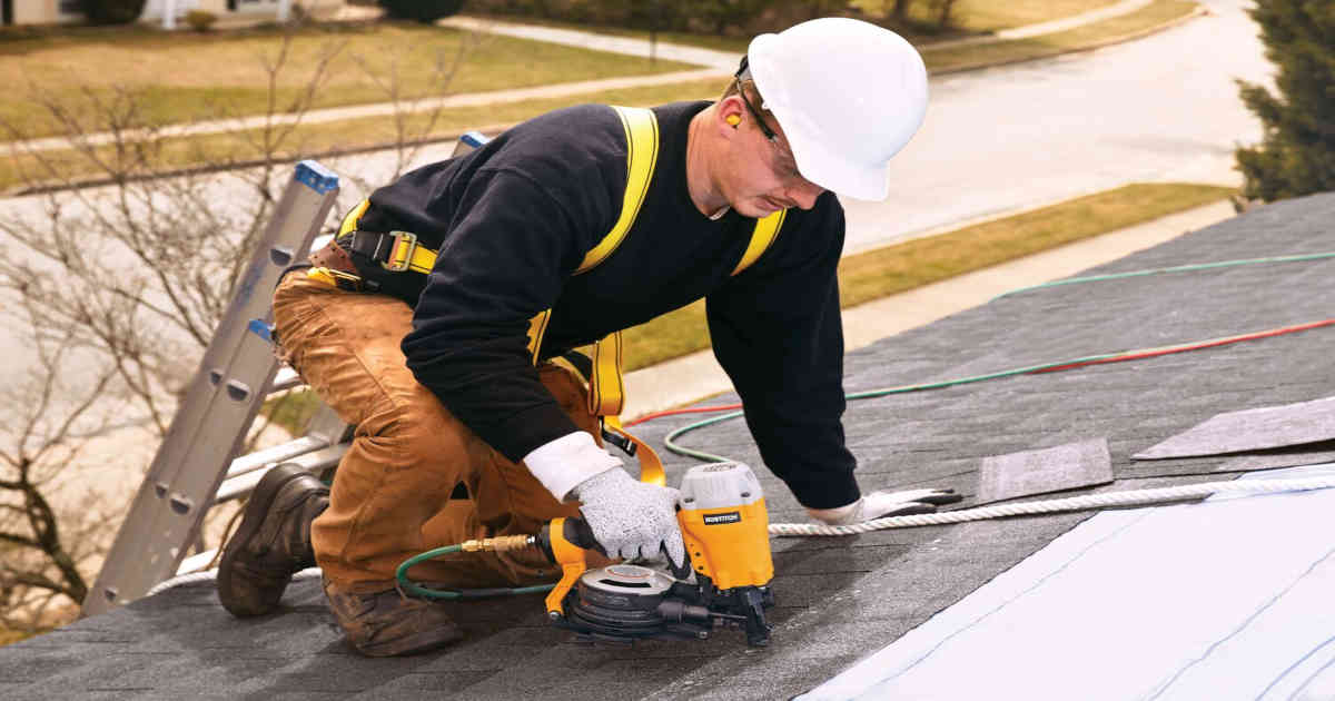 Roofing nail gun on a roof